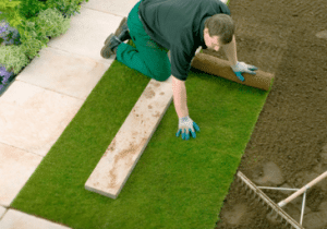 Man laying turf