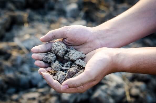 Testing clay soil in hands