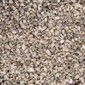 Close up of 10mm Limestone gravel chippings from Hallstone and delivered nationwide by Rolawn