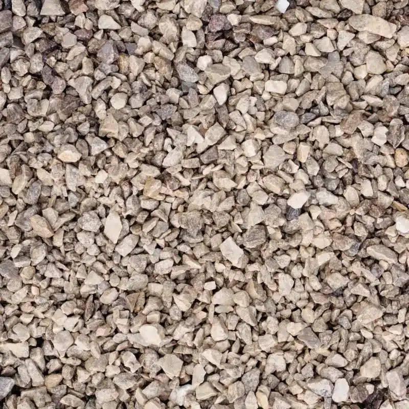 Close up of 10mm Limestone gravel chippings from Hallstone and delivered nationwide by Rolawn